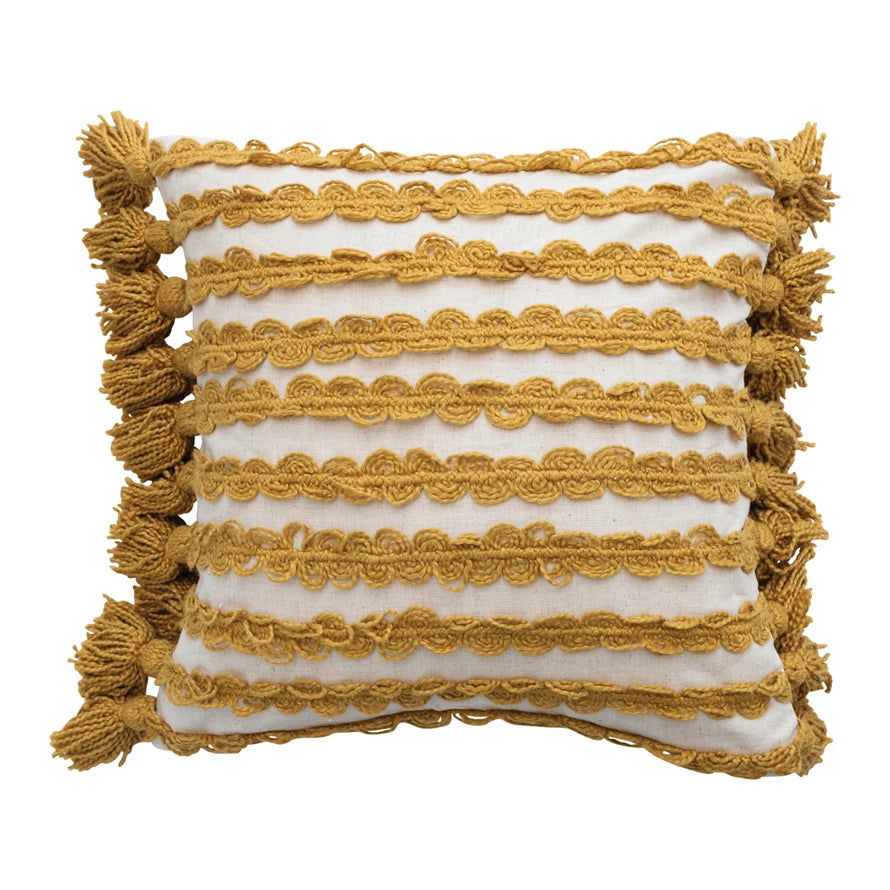 Add a touch of boho charm to your home decor with our Woven Cotton Pillow. Featuring playful Ric Rac stripes and tassel accents, this pillow is both stylish and cozy. Made from high-quality cotton, it's the perfect addition to any couch, chair, or bed.