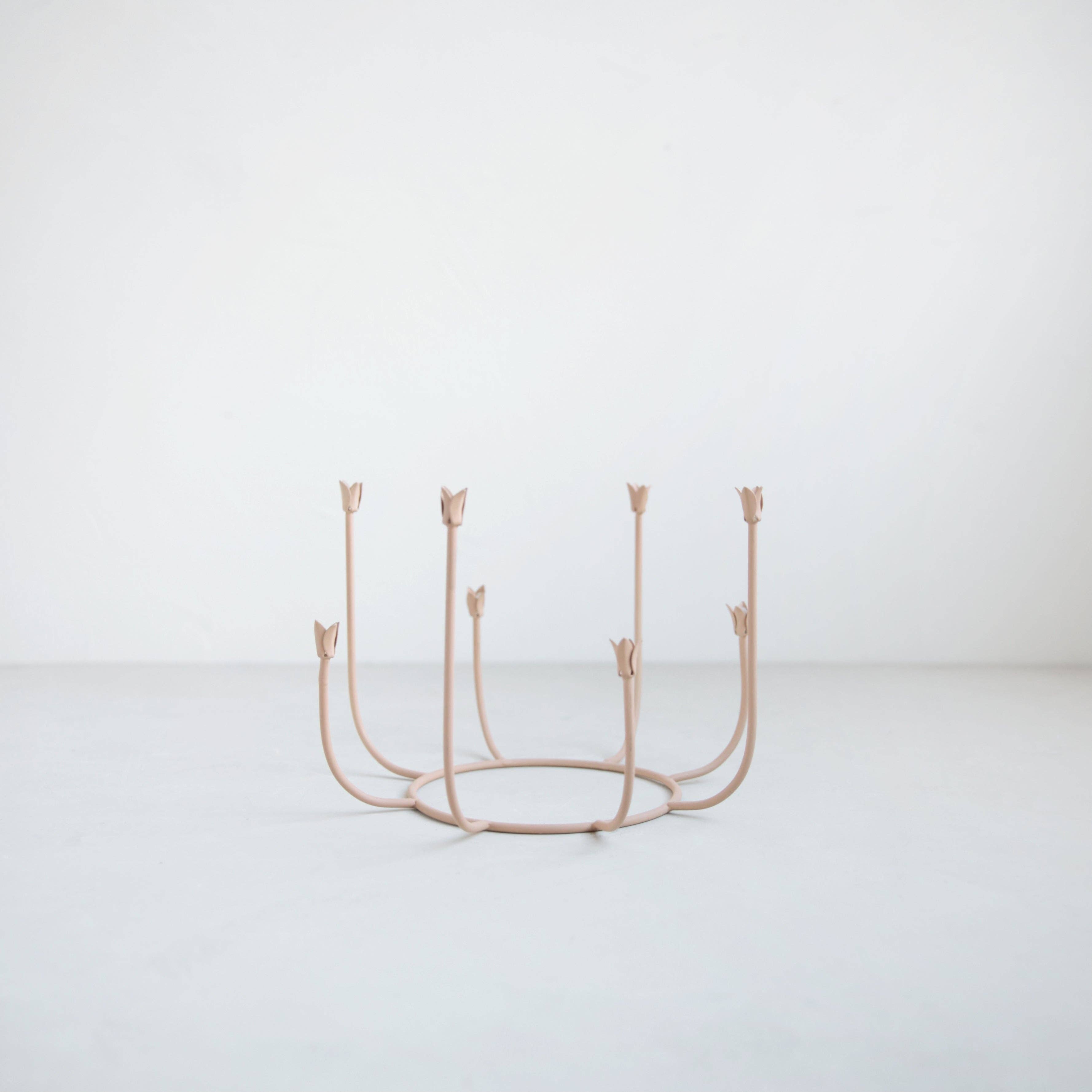 Decorative metal candelabra on a white background