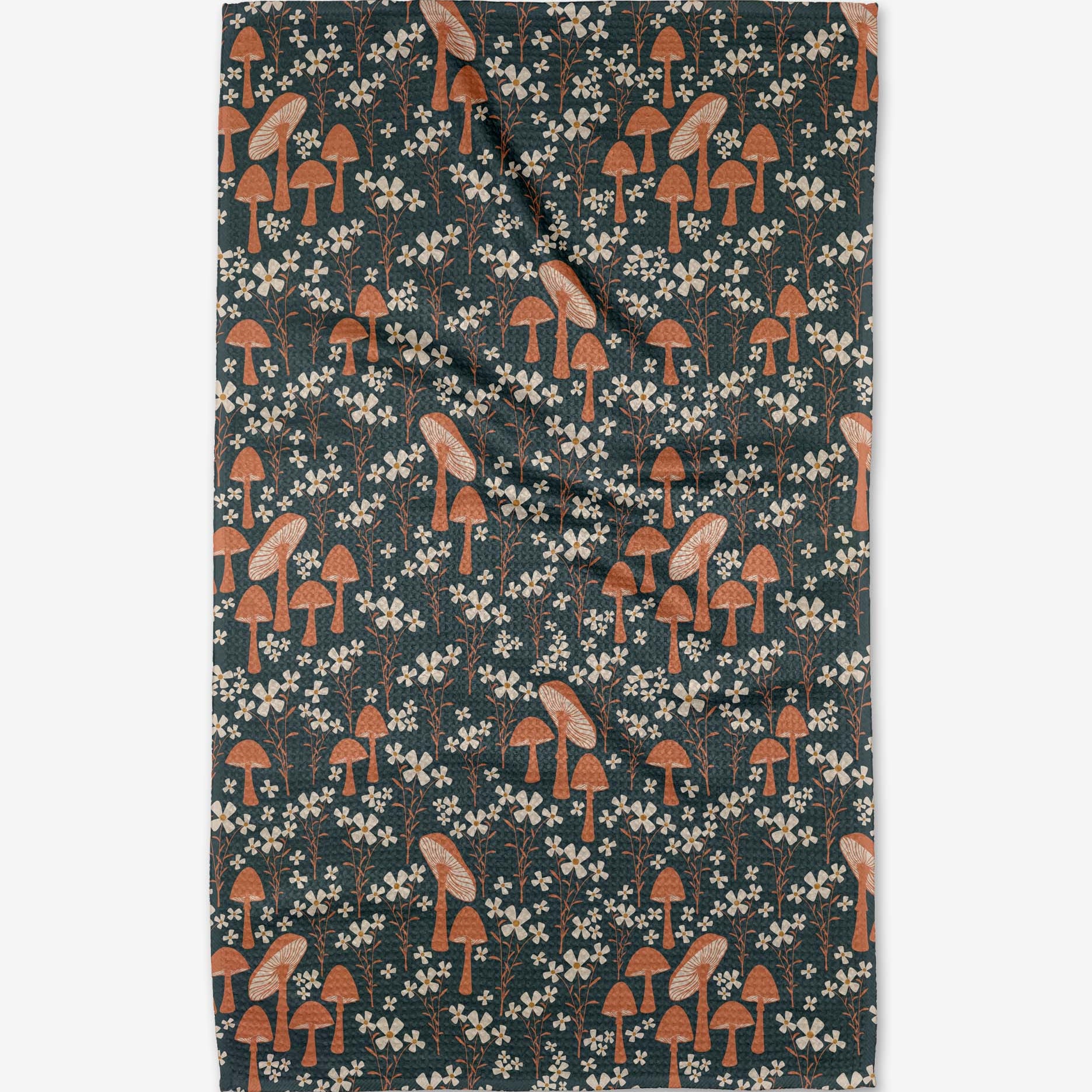 Patterned fabric with mushrooms and flowers on a dark background