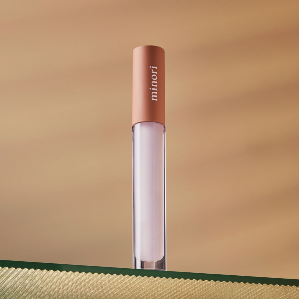 Our vegan Lip Gloss is ultra-moisturizing thanks to Shea Butter, Jojoba Seed Oil, and Vitamine E. It gives the lips a balm-like, smooth buttery texture that enhances your natural lip color, completing your everyday makeup routine. Not sticky at all! Sheer color for a "your lips but better" look. 
