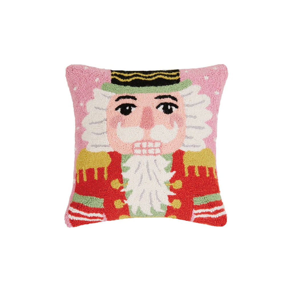 Nutcracker Hook Pillow     Material  Wool hook pillow, with cotton velvet backing.  Includes polyester insert, zipper closure     Size  16″ x 16″ x 2″