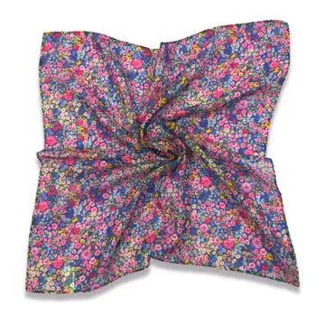 Add a touch of sunshine to your wardrobe with our Sunny Meadow Bandana. Perfect for any outfit, this playful accessory will keep you stylish on any adventure. So go ahead, embrace your inner flower child and rock this sunny bandana with confidence!