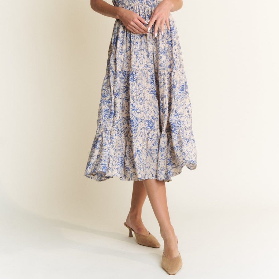 Get ready to turn heads in our Blue Combo Smocked Floral Print Midi Dress! This unique dress boasts a playful floral print and a flattering smocked design. Perfect for any occasion, this dress will have you looking and feeling your best. Don't miss out on this quirky and fun addition to your wardrobe! Sleeveless bodice, Fitted top, Loose fit bottom, Maxi/ankle length dress, 45% Rayon&nbsp; 55% Linen