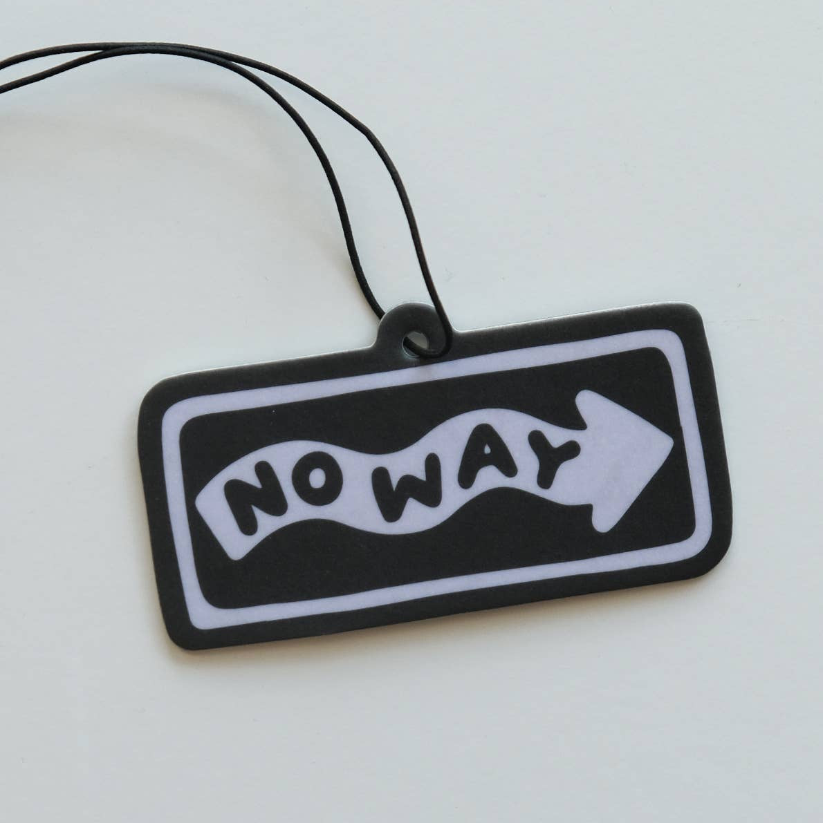 Black and white 'NO WAY' sign with an arrow on a white background