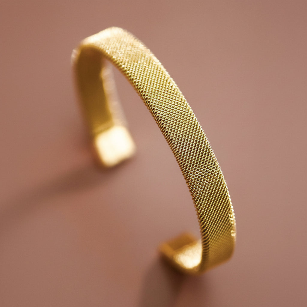 Gold cuff bracelet. 