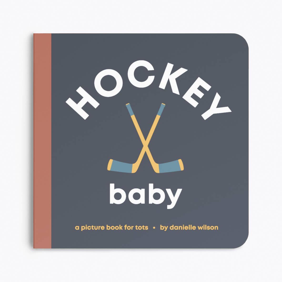 Book titled 'Hockey Baby' with hockey sticks on a gray background