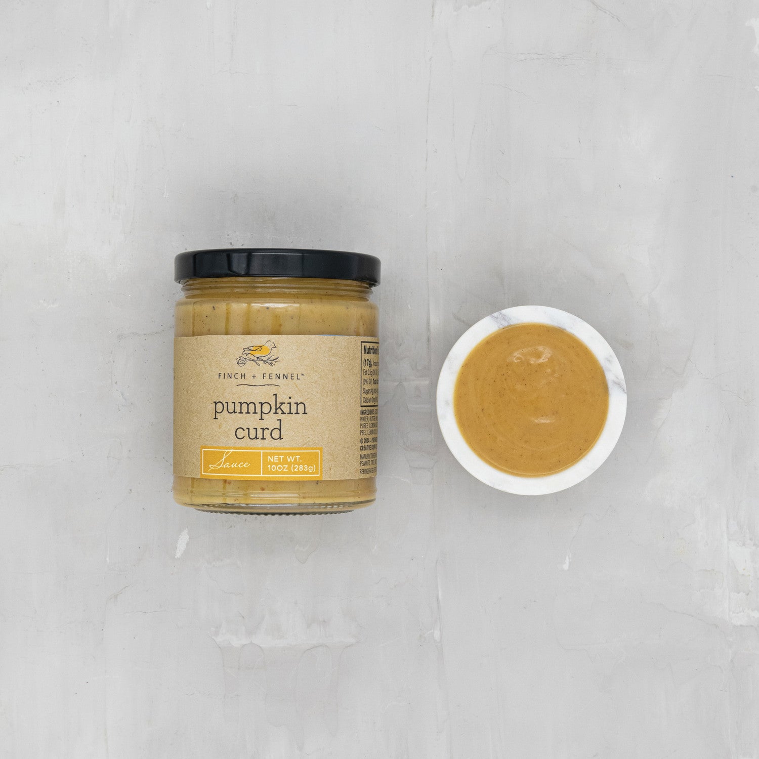 Indulge in the creamy, spiced goodness of our 10 oz. Pumpkin Curd Sauce. This rich and velvety sauce captures the essence of autumn with real pumpkin, warm spices, and a hint of tanginess. Perfect for spreading on toast, scones, or pastries, layering in trifles, or as a decadent topping for ice cream and yogurt. A seasonal treat that brings comforting fall flavor to any dessert.