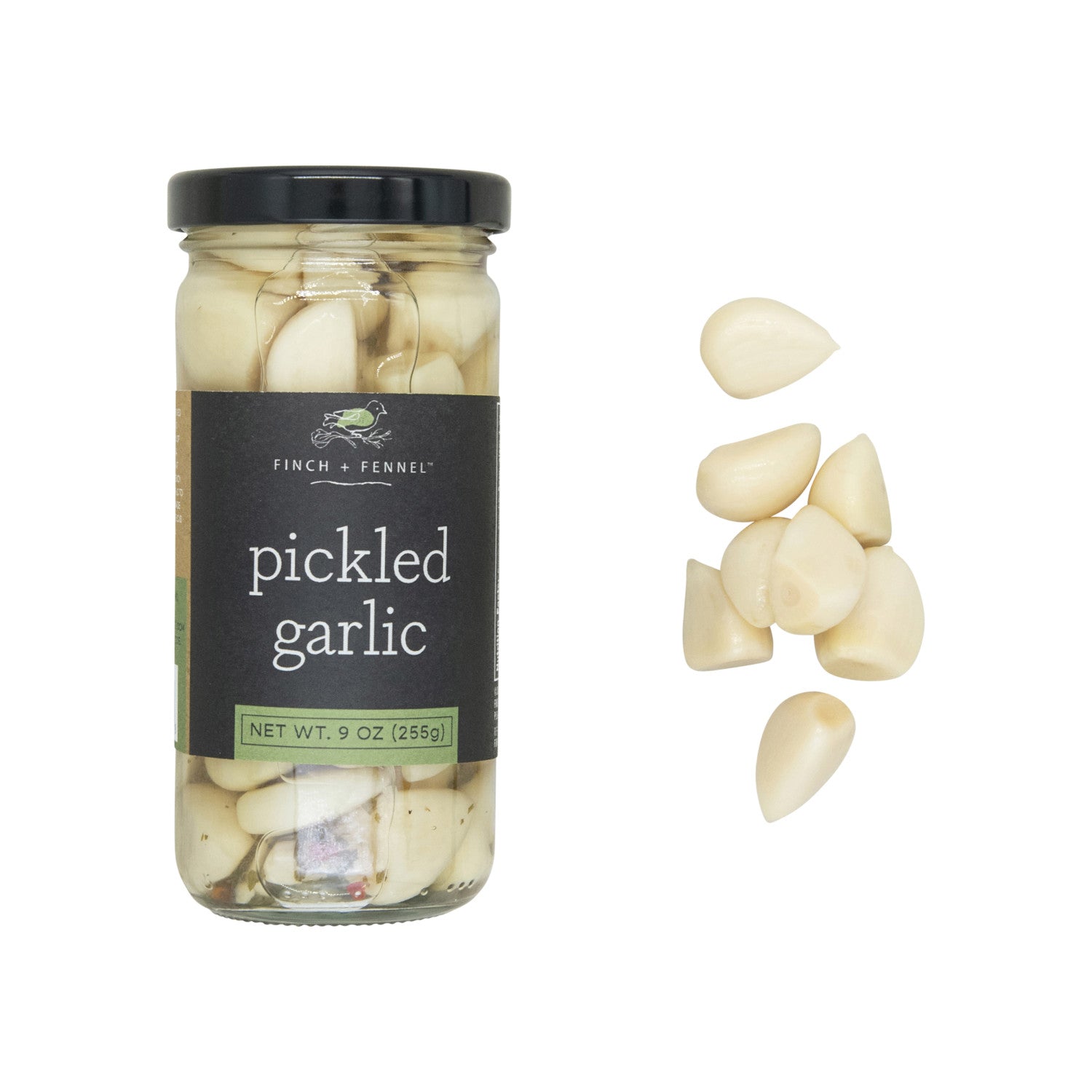 Elevate your pantry staples with our 9 oz. Pickled Garlic. These tender, tangy garlic cloves are perfectly pickled to deliver a crisp texture and a mild, savory flavor. Use them straight from the jar as a zesty snack, slice them into salads, incorporate them into charcuterie boards, or finely chop them to enhance sauces and vinaigrettes. A flavorful and versatile addition to any kitchen.