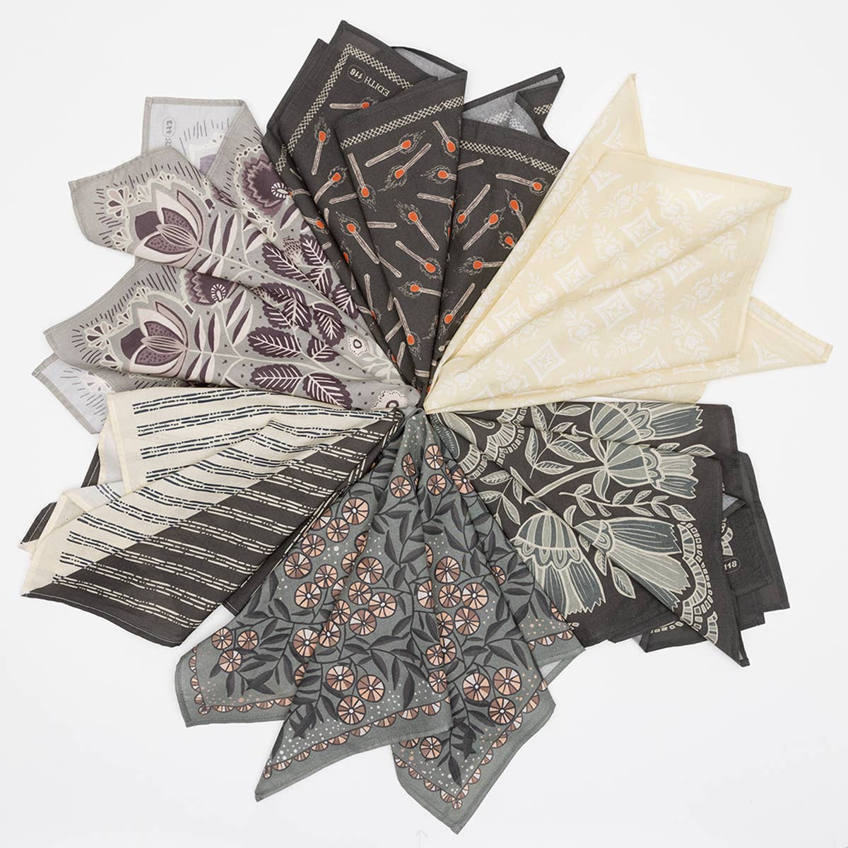 Collection of patterned fabric swatches arranged in a circular display.