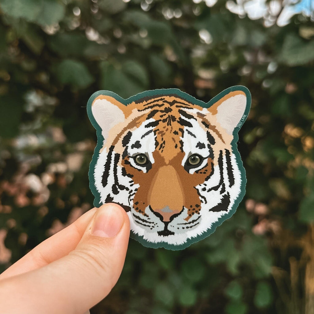 vibrant tiger head sticker with a green outline
Width: 2.5 inches
Height: 2.5 inches