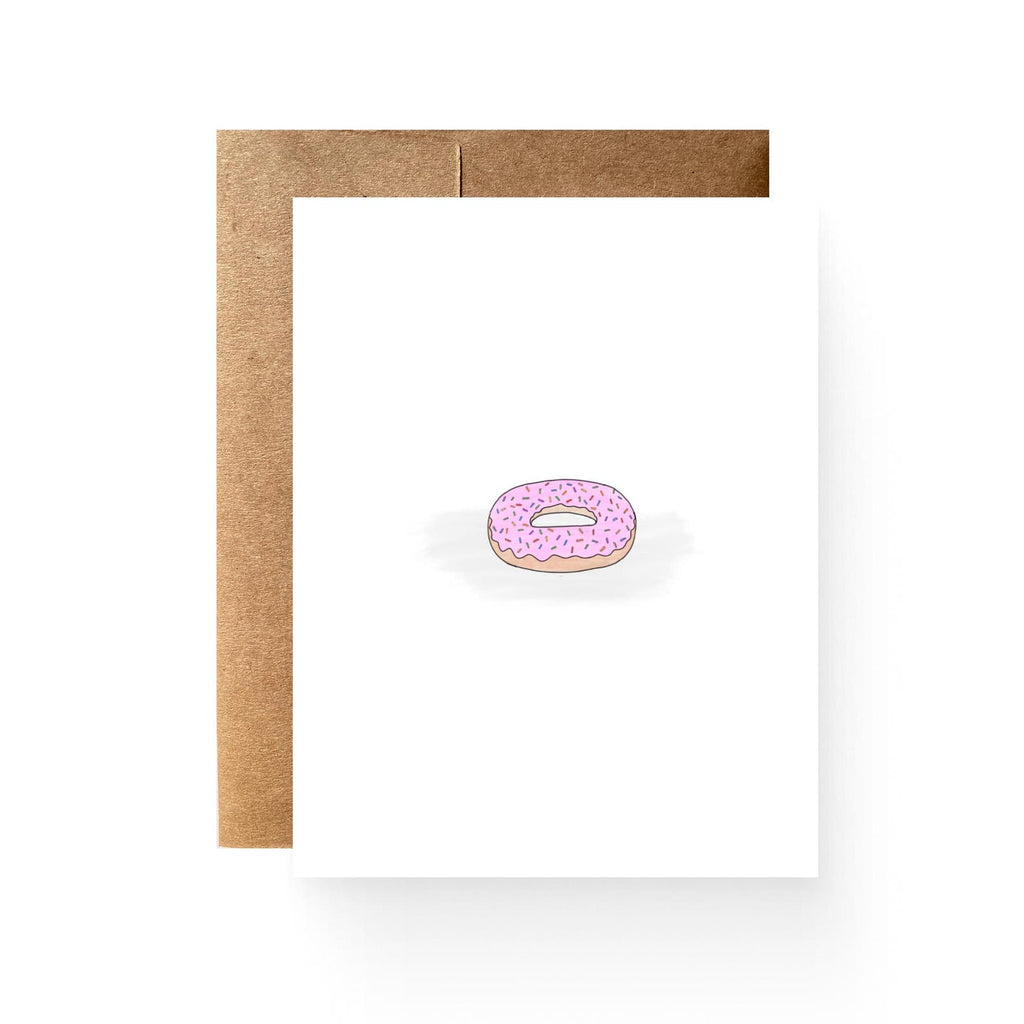 white card with an illustration of a pink sprinkled donut