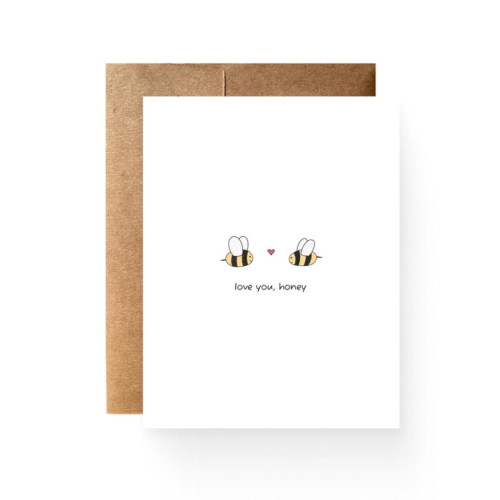 white card with two honey bees and a heart reading "love you, honey"