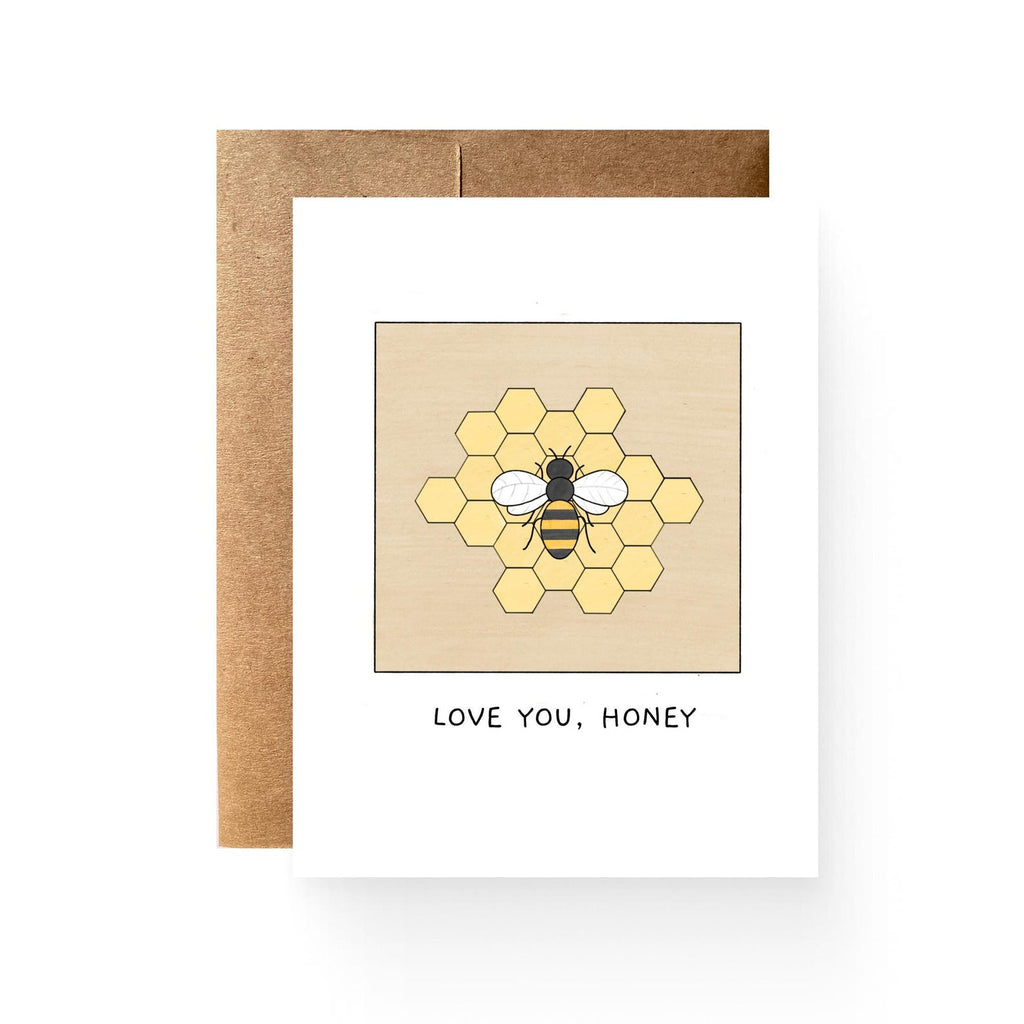 white card with a tan square featuring a honeycomb design and a honey bee. reading "Love you, honey"
