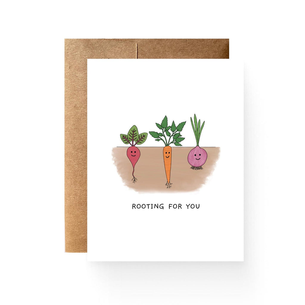 white card with a radish, carrot, and onion growing in the dirt. reading "Rooting for you"