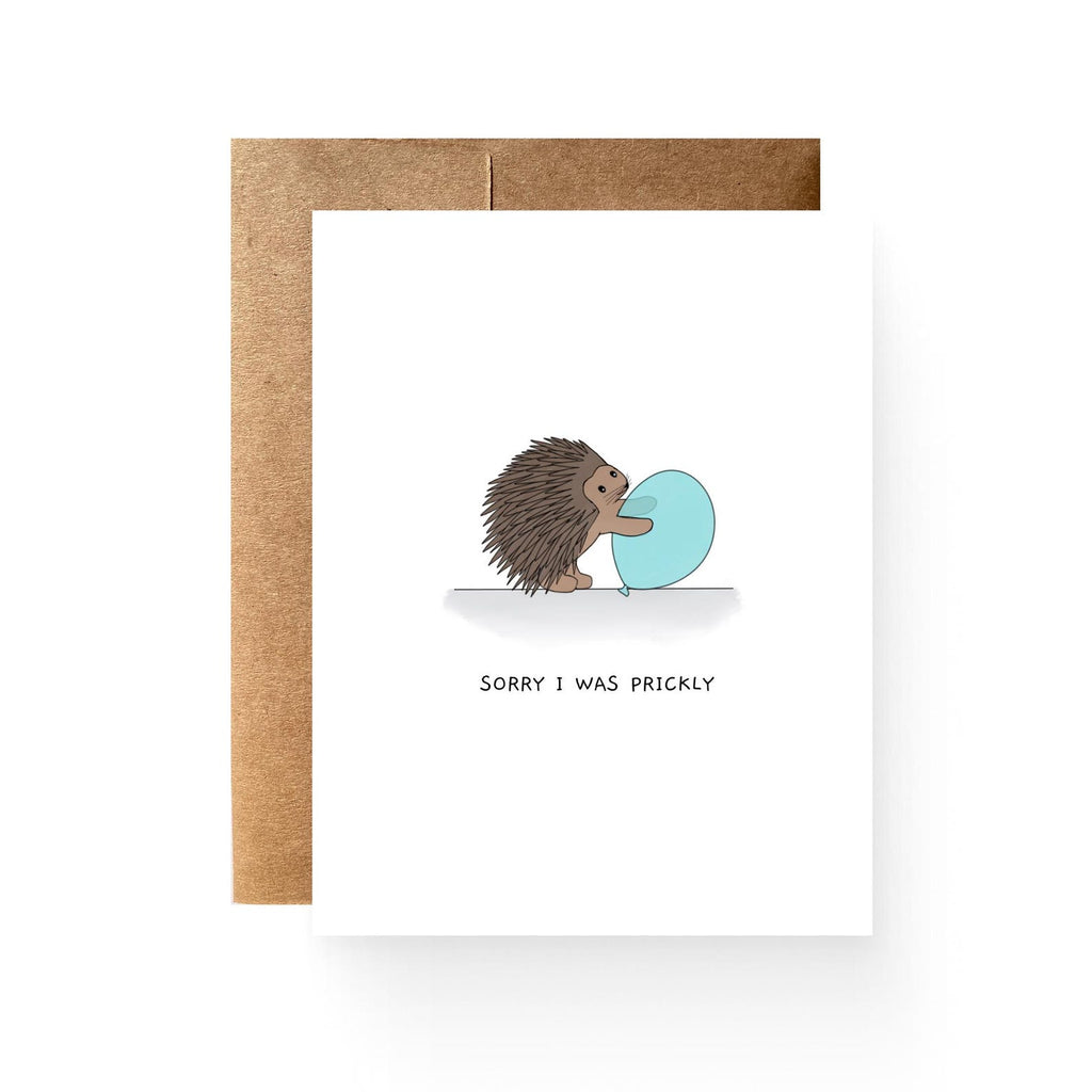 white card with a porcupine holding a balloon reading "sorry i was prickly"
