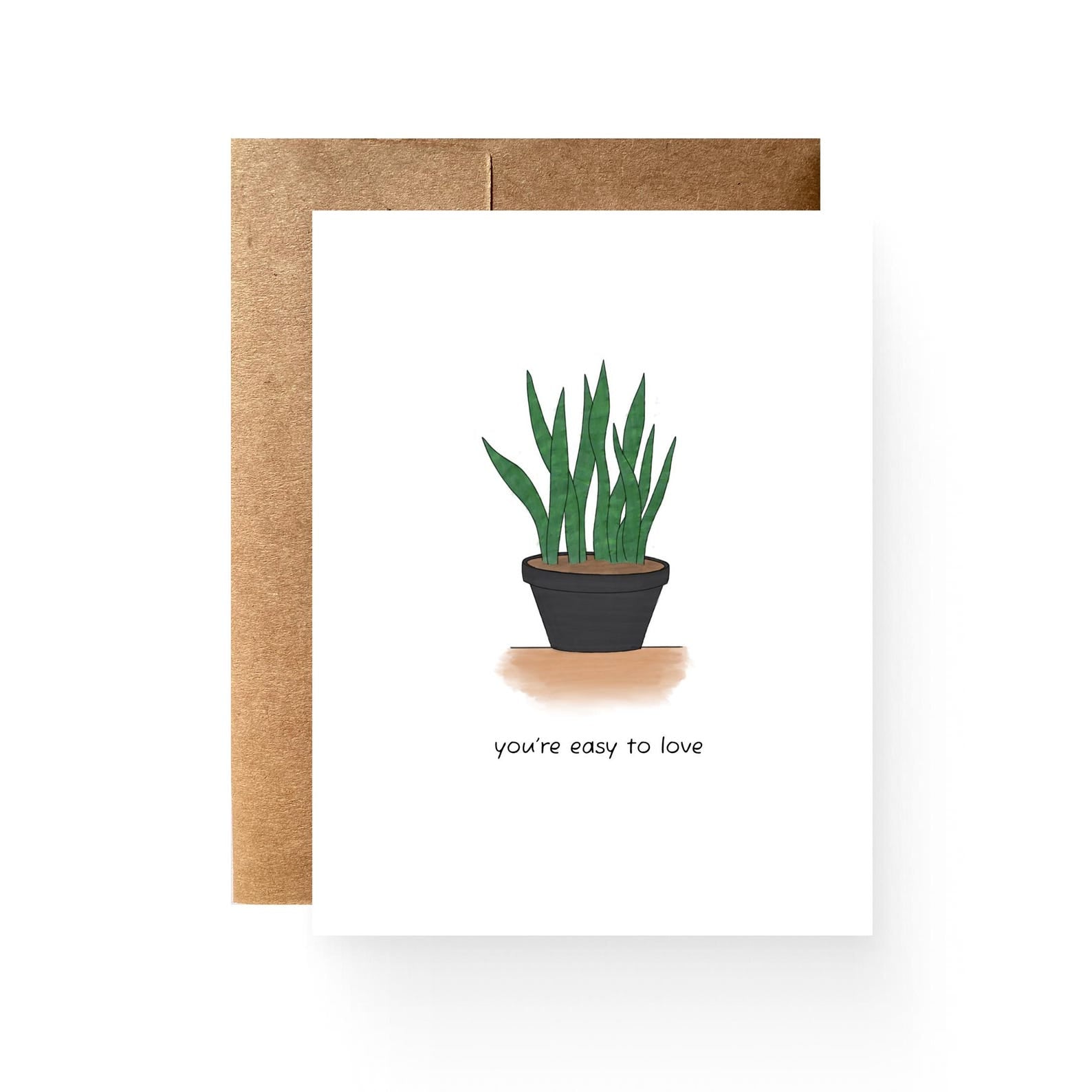 white card with a potted snake reading "you're easy to love"