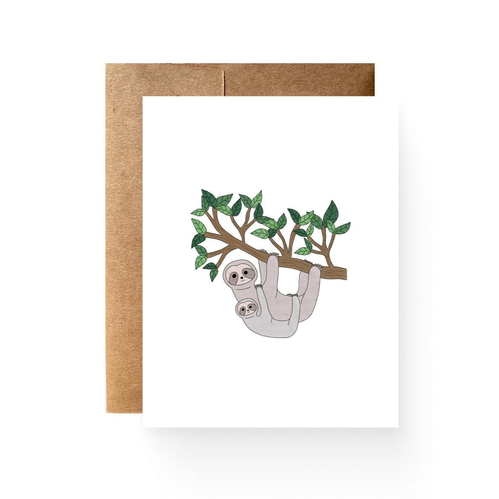 white card with a mother and baby sloth hanging onto a tree branch
