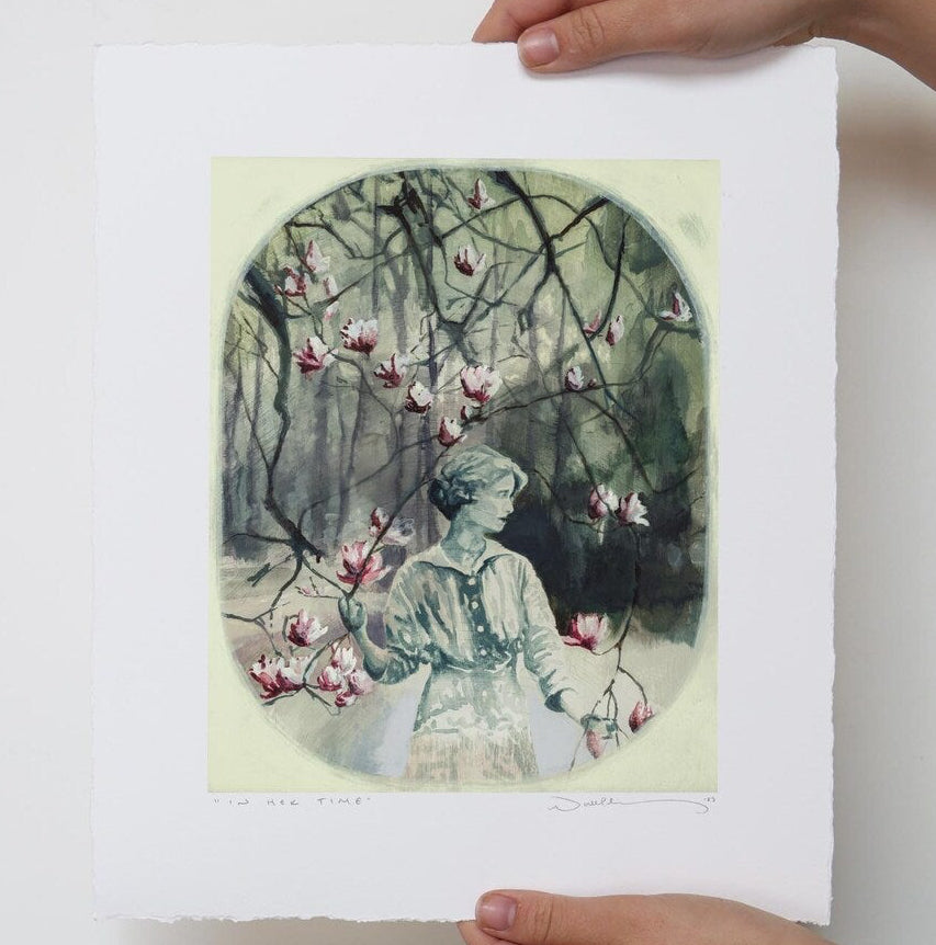 Woman walks among pink magnolias in a moody forest. 
