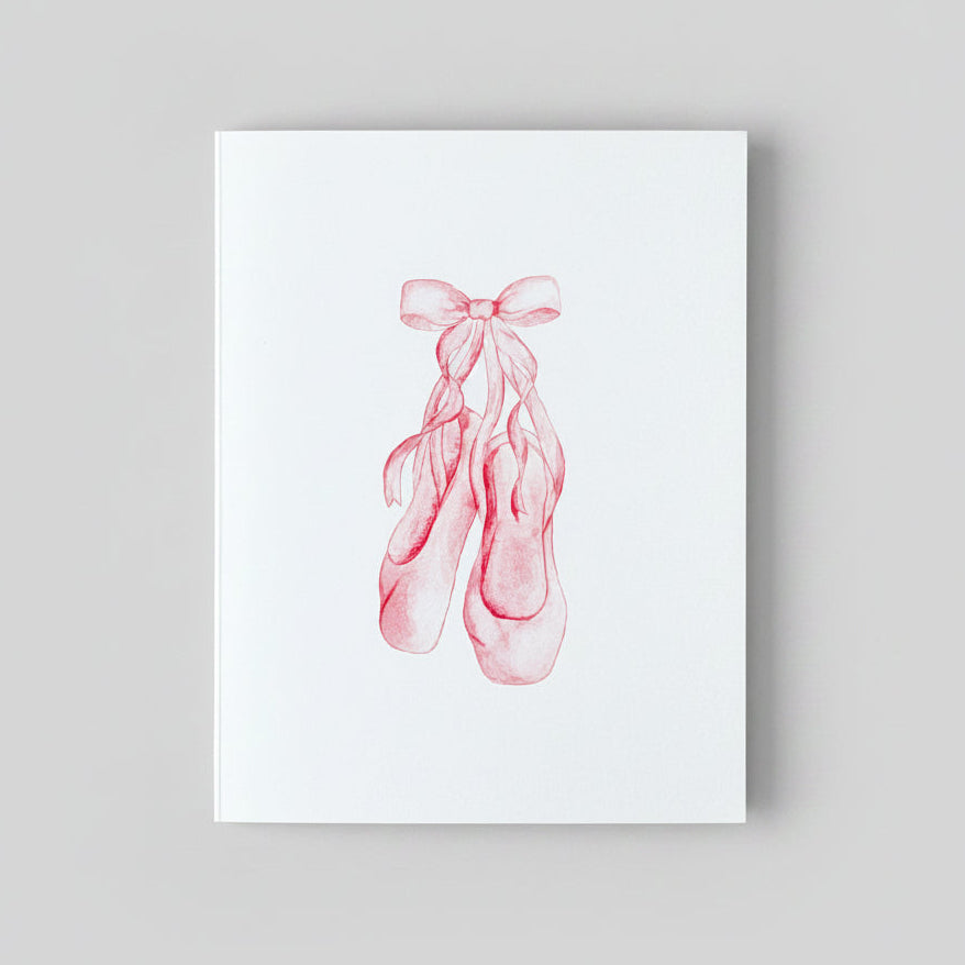 White print with pink ballet shoes laced into a bow. 