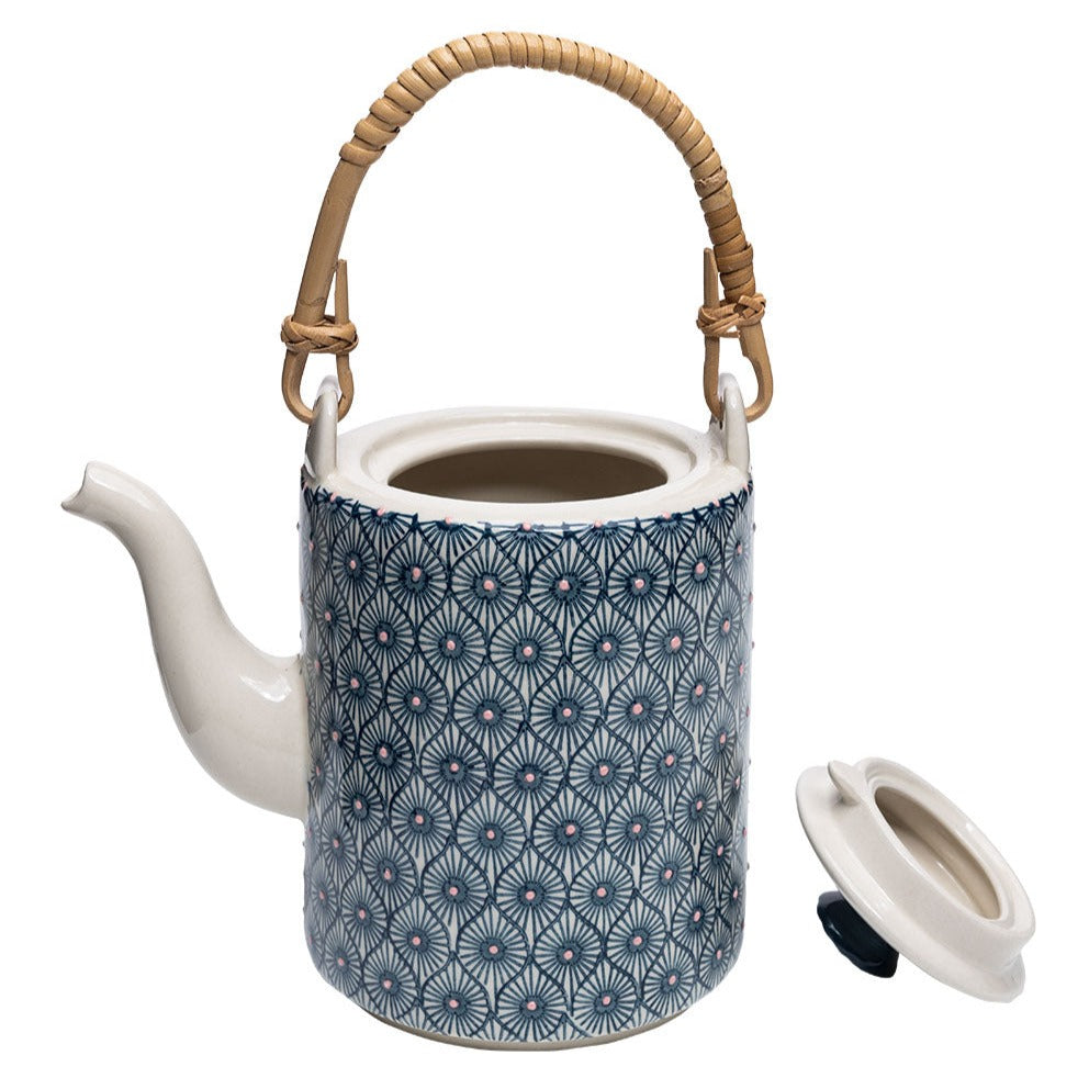 Brew up some fun with our quirky Teapot! This ceramic pot is perfect for steeping your favorite tea leaves, and its playful design will add a touch of whimsy to your kitchen. It's the perfect blend of form and function, making tea time a delight.
