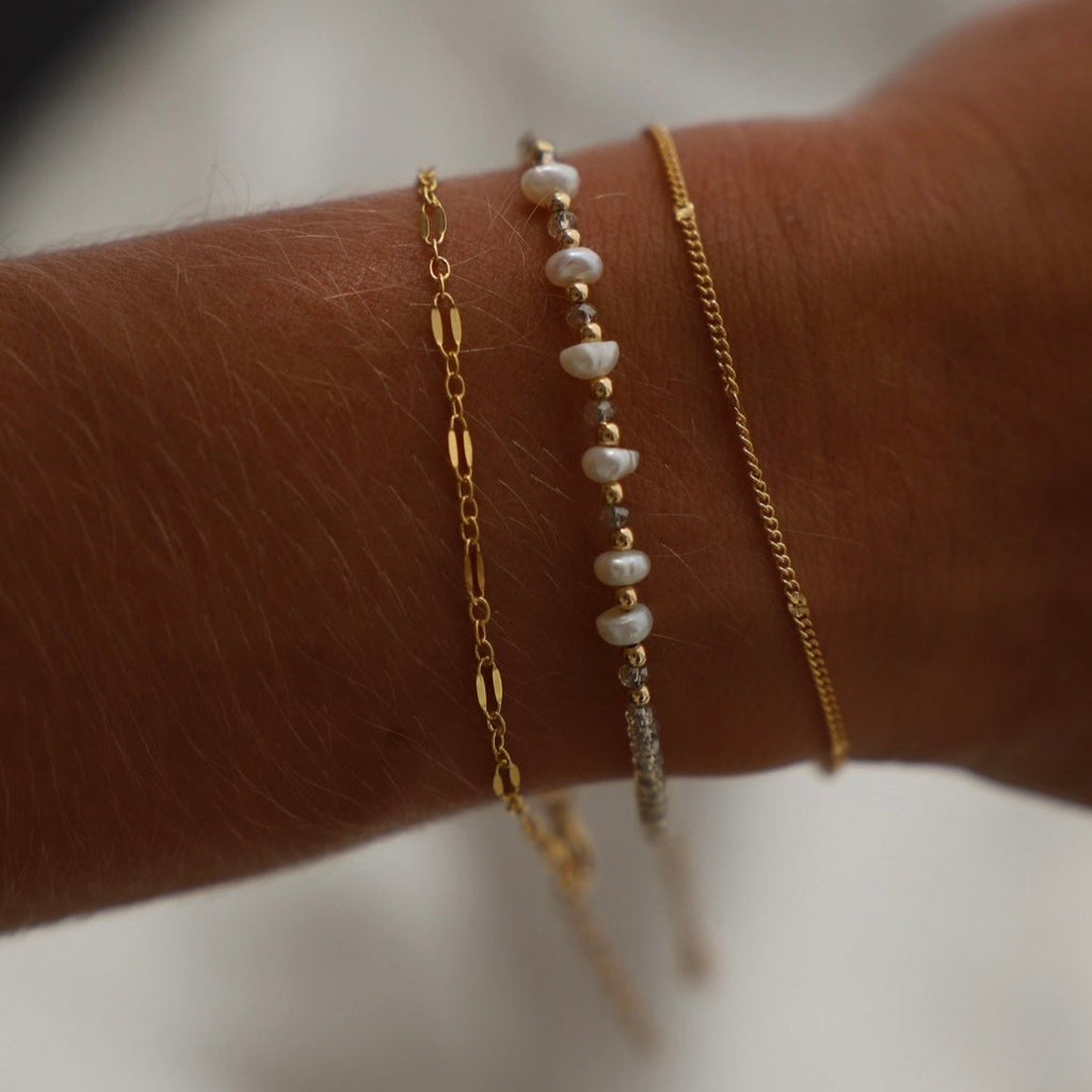 Be the belle of the beach with the Golden Sands Bracelet! A summery accessory made with sand-colored crystals and gold-filled and freshwater pearl beaded accents, this bracelet is just what you need to spruce up your look.