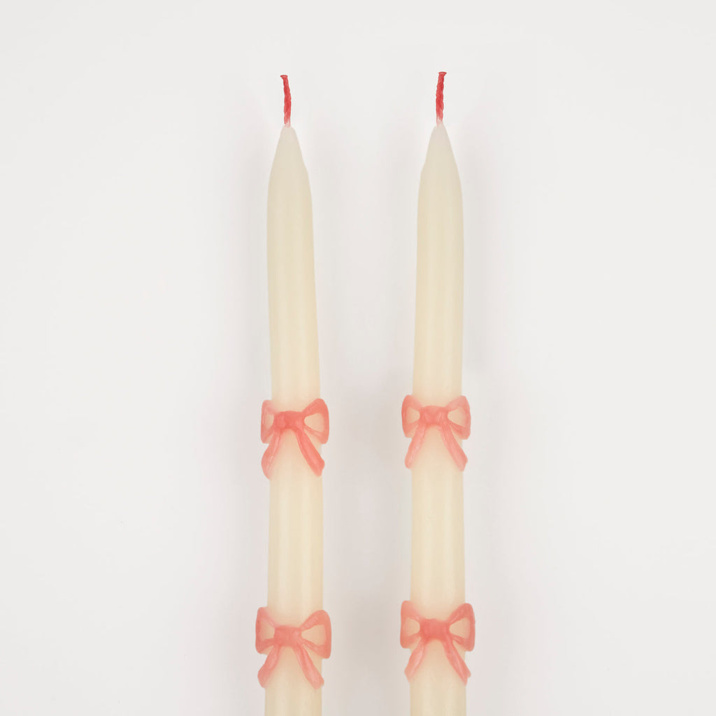 These tapered bow candles, have a special surprise detail - pink wicks! A wonderful hostess gift, or use to decorate the table or mantel at a party where pink will look just perfect, like a baby shower, bridal shower, princess or fairy party.