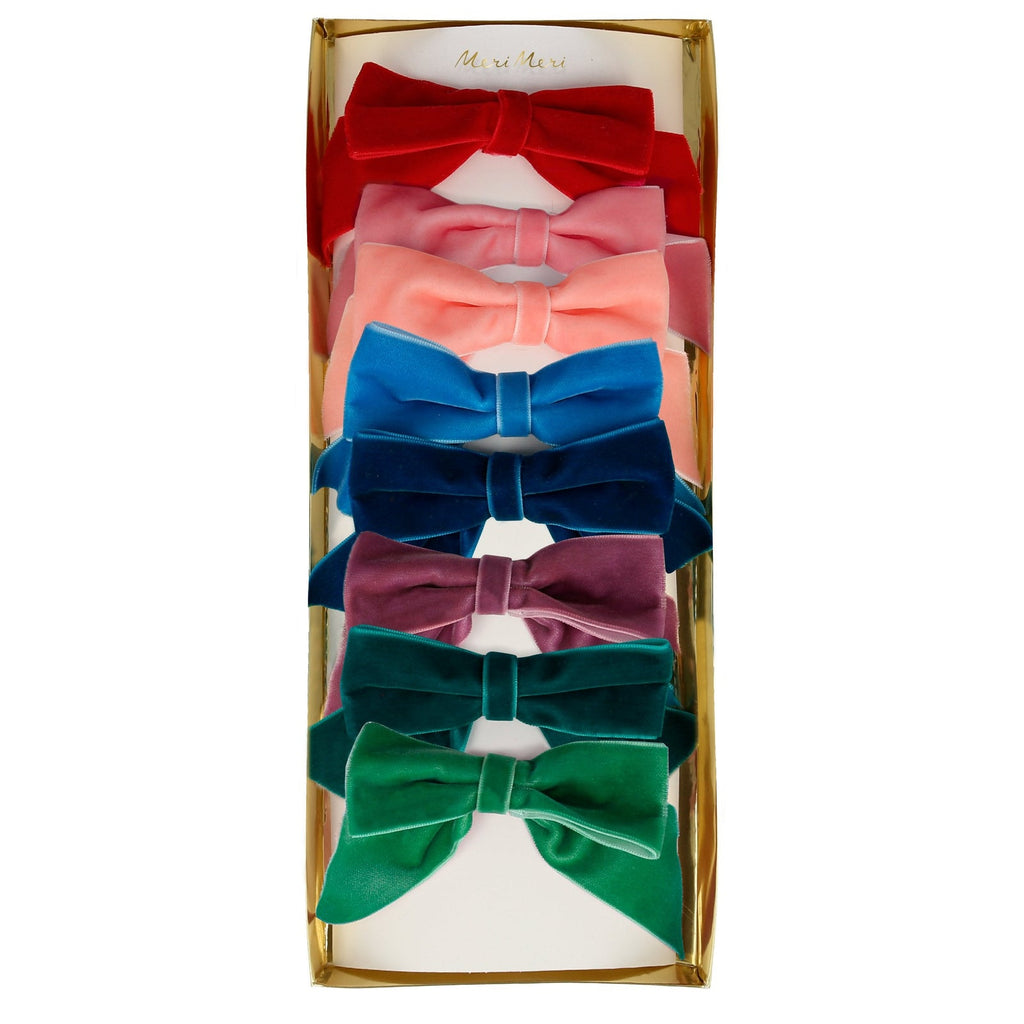 This set of beautiful bow clips, crafted out of soft cotton velvet, will make a wonderful gift for a special someone who adores hair accessories. The perfect way to add a colorful touch of elegance to any hair style.