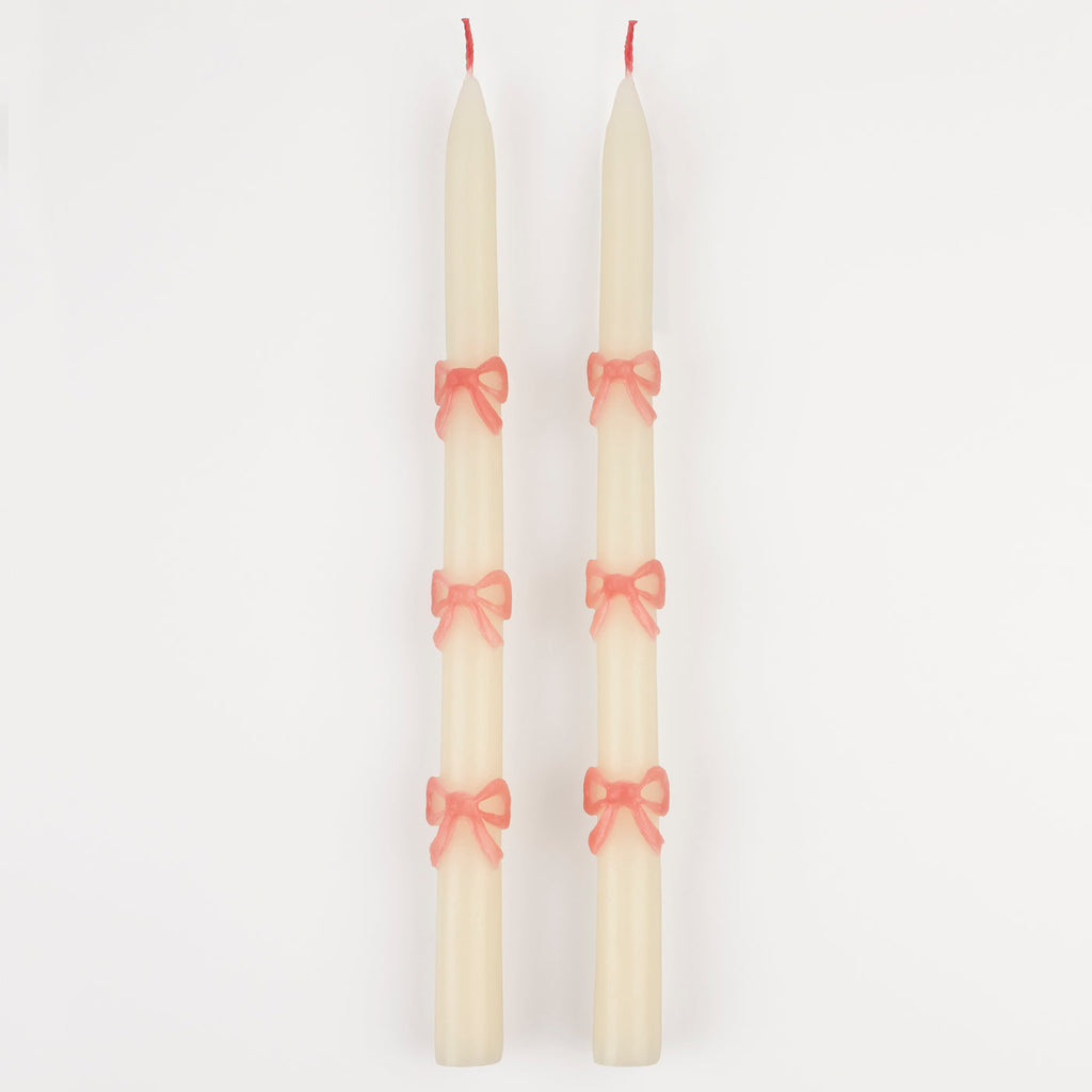 These tapered bow candles, have a special surprise detail - pink wicks! A wonderful hostess gift, or use to decorate the table or mantel at a party where pink will look just perfect, like a baby shower, bridal shower, princess or fairy party.
