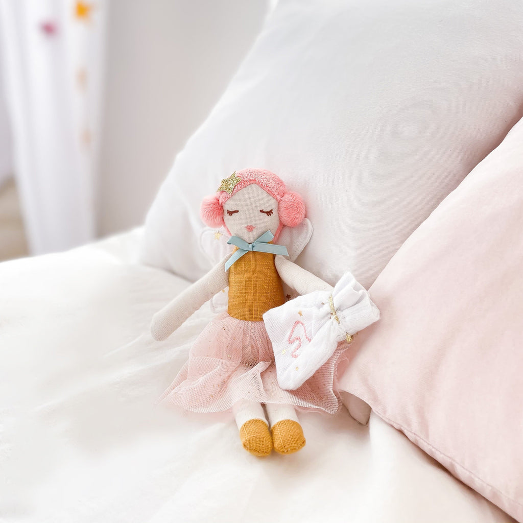 Make sure that every tooth fairy visit is special for your little one with this adorable Tooth Fairy Doll with Pouch! Cuddled up in its cute pouch, this tooth fairy will spread joy with a sprinkle of fairy wishes and dreams! Get ready to see your child's face light up!!!