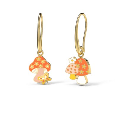 Vintage-style mushrooms and butterflies collide on these wonderfully psychedelic earrings. Wear one on each ear, or combine them on a double ear piercing!  Presented in a matchbook style gold foil box, our signature mismatched earrings feature 18k gold gilt enamel on hanging earwire. Hypoallergenic, nickel, lead, and cadmium-free! 