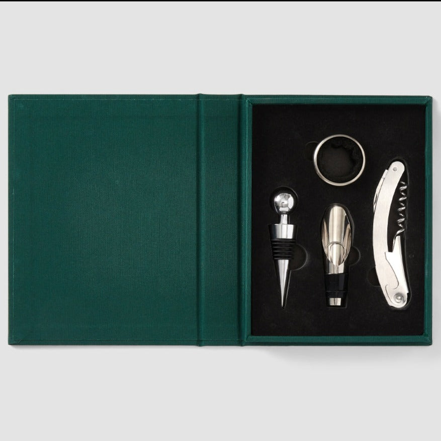 Discover the essential kit for perfecting your wine experience - a refined toolbox in an elegant book-like box. Inside, you'll find an opener, stopper, pourer, and collar, each serving as essential tools in wine appreciation.