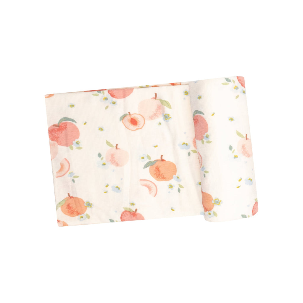 Snuggle, Swaddle , Sleep , Repeat. Our soft and adorable print swaddles are sure to delight everyone! Versatile design that's great for swaddling, nursing , cuddling and so much more. Spring Peaches