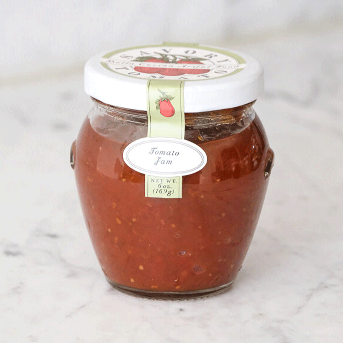 Savory Tomato Jam is both sweet and savory, with a decadent undertone of ceylon cinnamon that permeates the sweetness of locally grown tomatoes. An elegant everyday ketchup replacement, this jammy spread will elevate your average burger or grilled cheese and enhance your mom's meatloaf.

Ingredients

Tomatoes, sugar, vinegar, citrus juice and zest, cinnamon