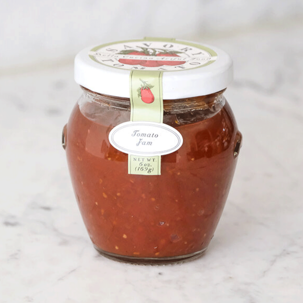Savory Tomato Jam is both sweet and savory, with a decadent undertone of ceylon cinnamon that permeates the sweetness of locally grown tomatoes. An elegant everyday ketchup replacement, this jammy spread will elevate your average burger or grilled cheese and enhance your mom's meatloaf.

Ingredients

Tomatoes, sugar, vinegar, citrus juice and zest, cinnamon