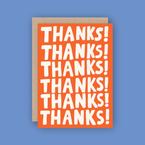 red/orange card reading "THANKS!" in white ink 6 times