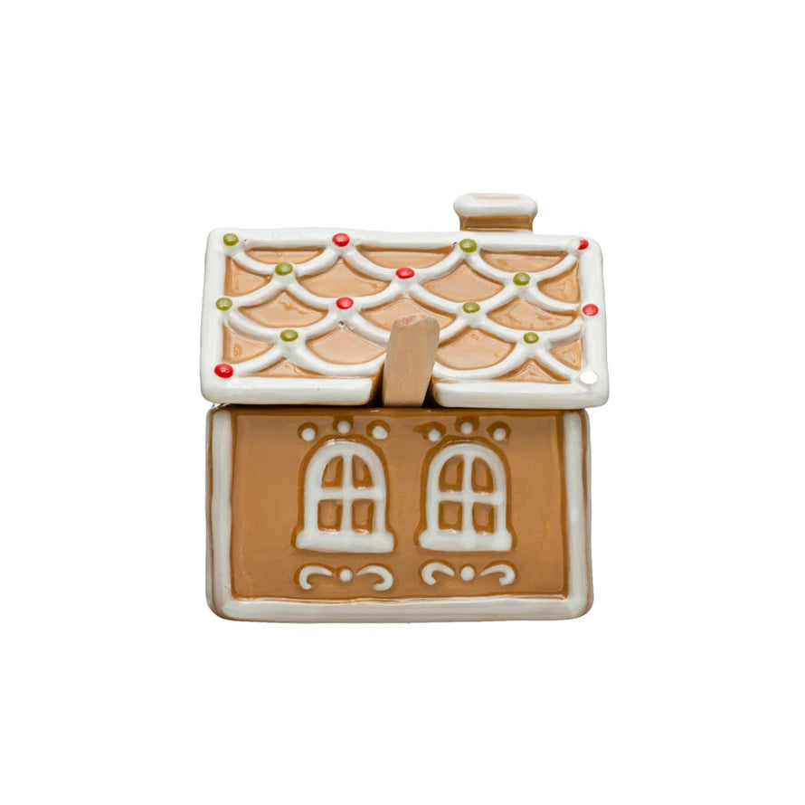 Sugar up your day with a colorful and whimsical treat! Our hand-painted ceramic gingerbread house sugar pot comes complete with a wooden spoon and a sweet tooth-approved outlook. Stir with style and spread a touch of sweetness wherever you go!     Size   4-1/2"L x 3-3/4"W x 4-1/2"H  8 oz.