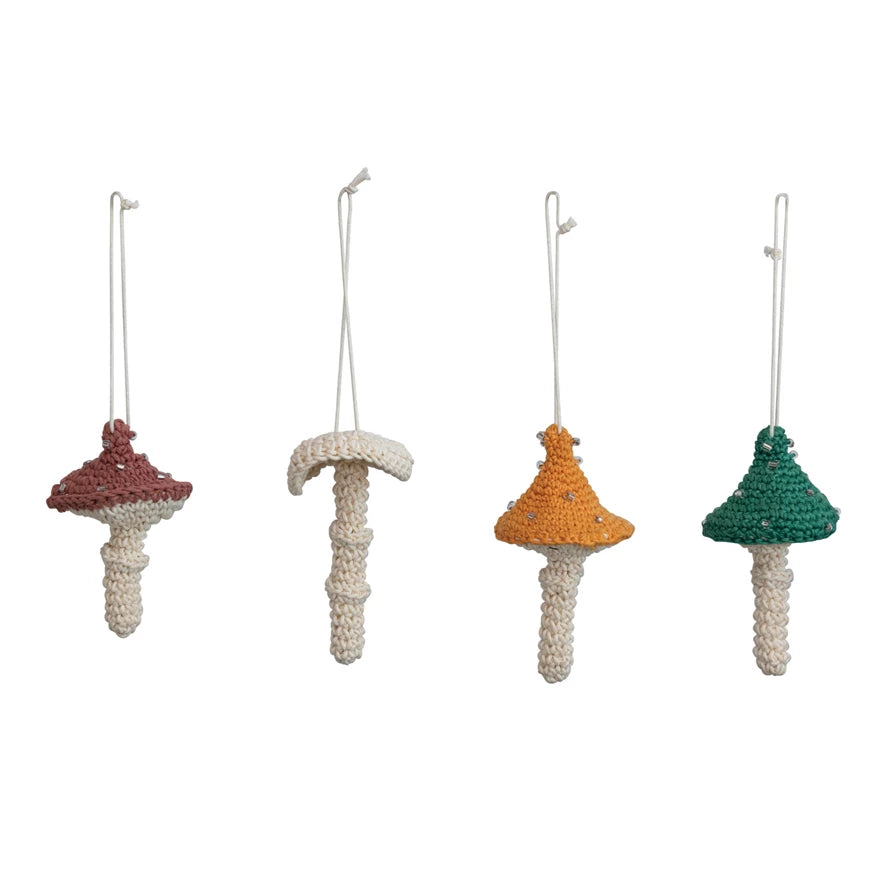 Decorate your home with these totally unique and swanky Beaded Cotton Crocheted Mushroom Ornaments. Featuring a bright and colorful array of vibrant hues, these lil' guys are sure to liven up any room. Get creative and mix and match the four styles for a fun and one-of-a-kind look!     Size  4"H. Pink, cream, mustard & teal