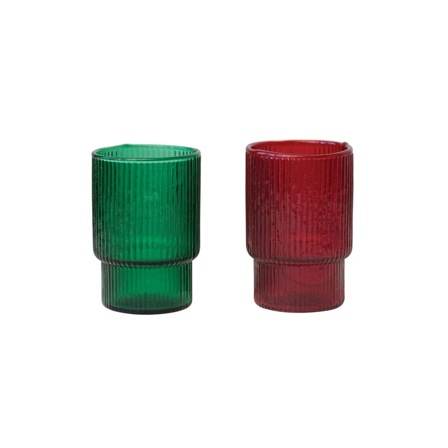 This ribbed drinking glass is the perfect way to add a splash of color to your day! Available in red or green to match any style, its fun, ribbed design is sure to impress! Its smooth silhouette and easy-to-hold shape make it the perfect daily companion. Double the fun with one of each color!     *THIS ITEM IS PICK UP ONLY*     Colors  Red  Green    Size  2-1/2" Round x 3-3/4"H   10 oz