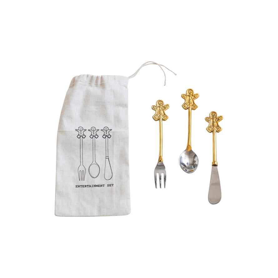 Make cleanup after a festive feast a breeze with these charming, gingerbread-man-handled cutlery! The classic metal and brass design set off the whimsical handles perfectly, so you can cut into your meal with style and fun. Plus, you can choose from three types, so you can mix and match to create the perfect table setting! Get 'em while they last!     Color  Brass & Metal     Dimensions   5-1/2"L 