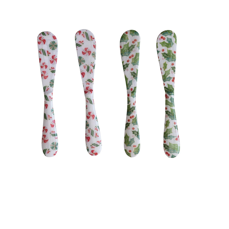 Add a touch of whimsy to your canapés with this enameled stainless steel canape knife! A sweet-as-candy and holly design is available in two styles, with multi-colored hues that are sure to "spice up" your snack spread.      Style  Candy  Holly     Materials  Stainless Steel     Dimensions  6"L