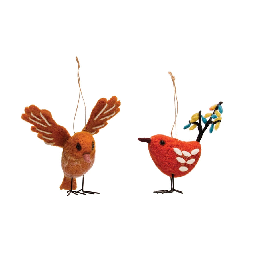 Bring your home some avian décor with this eclectic wool felt bird ornament featuring metal legs. Hang it in your window or stand it proudly in your fireplace mantle—it’s sure to be the “tweet” of the town! (Wink, wink.)     Size   4-1/4"H - 5-3/4"H