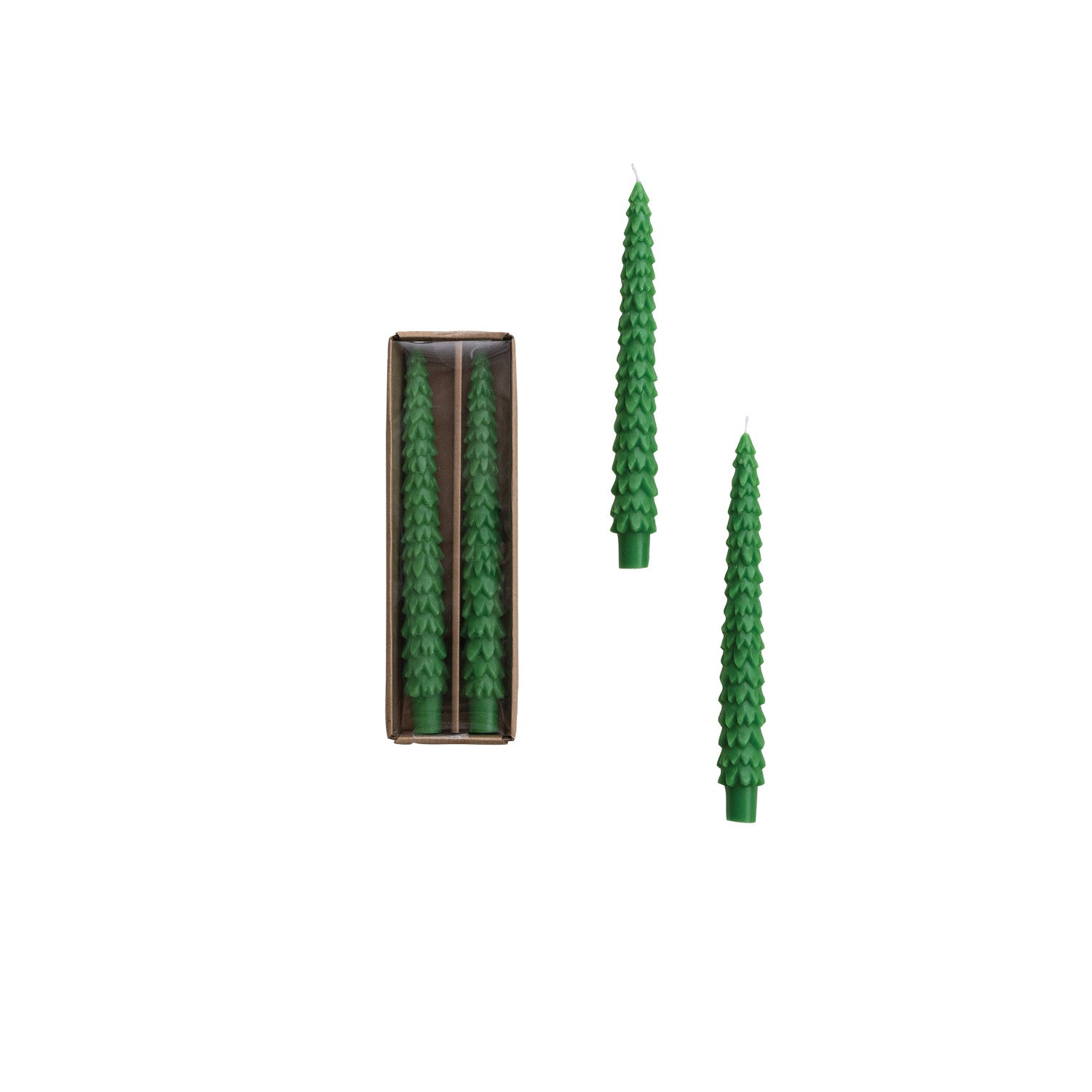 Two green tree shaped candles on a white background