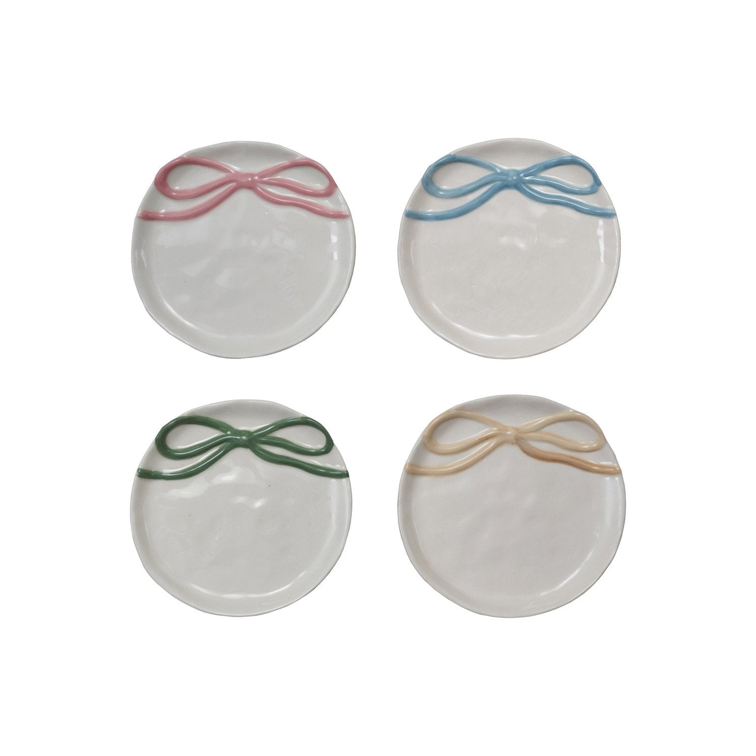 plates with decorative bows on a light background