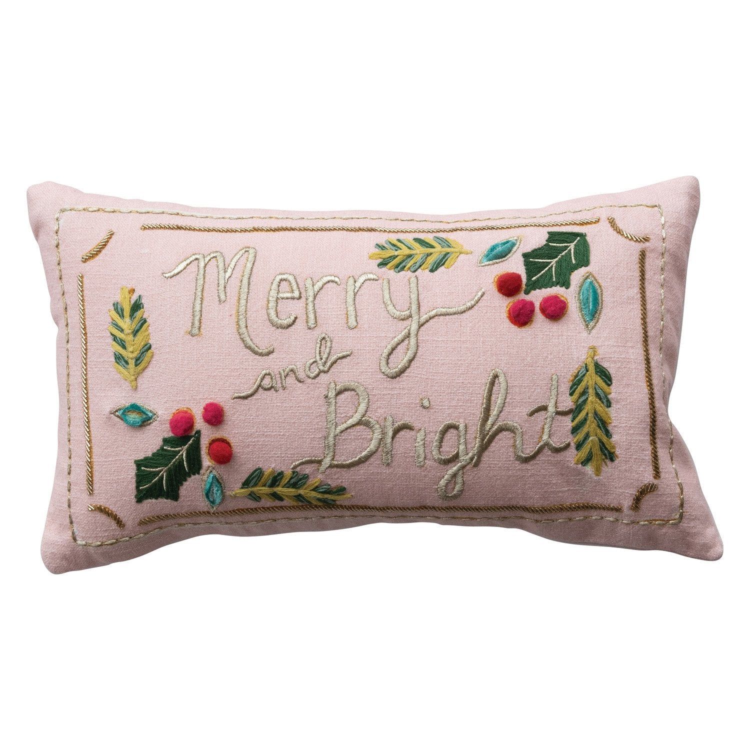 Decorative pillow with 'Merry and Bright' embroidery on a light pink background