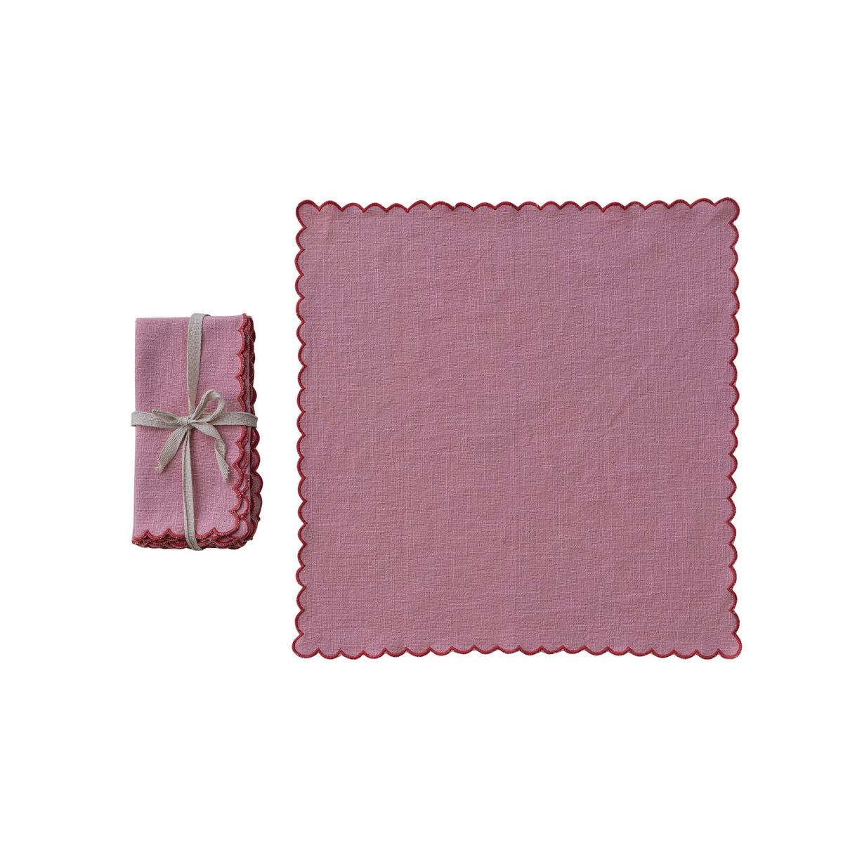 Scalloped Cotton Napkin Set - Red. Bring charm and cozy elegance to your dining table with our Scalloped Cotton Napkin Set in vibrant red. Crafted from soft cotton with beautifully detailed contrasting stitched edges, this set of four adds a thoughtful, inviting touch to every meal and holiday gathering.