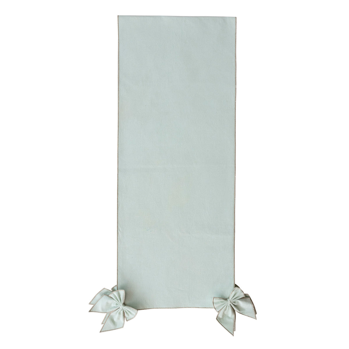 Detachable Bow Table Runner - Metallic Silver. Add an elegant, festive touch to your dining setup with our Detachable Bow Table Runner. Crafted from a soft cotton-linen blend and detailed with shimmering metallic silver thread stitched edges, this charming runner brings warmth, versatile style, and a holiday sparkle to all your table gatherings.