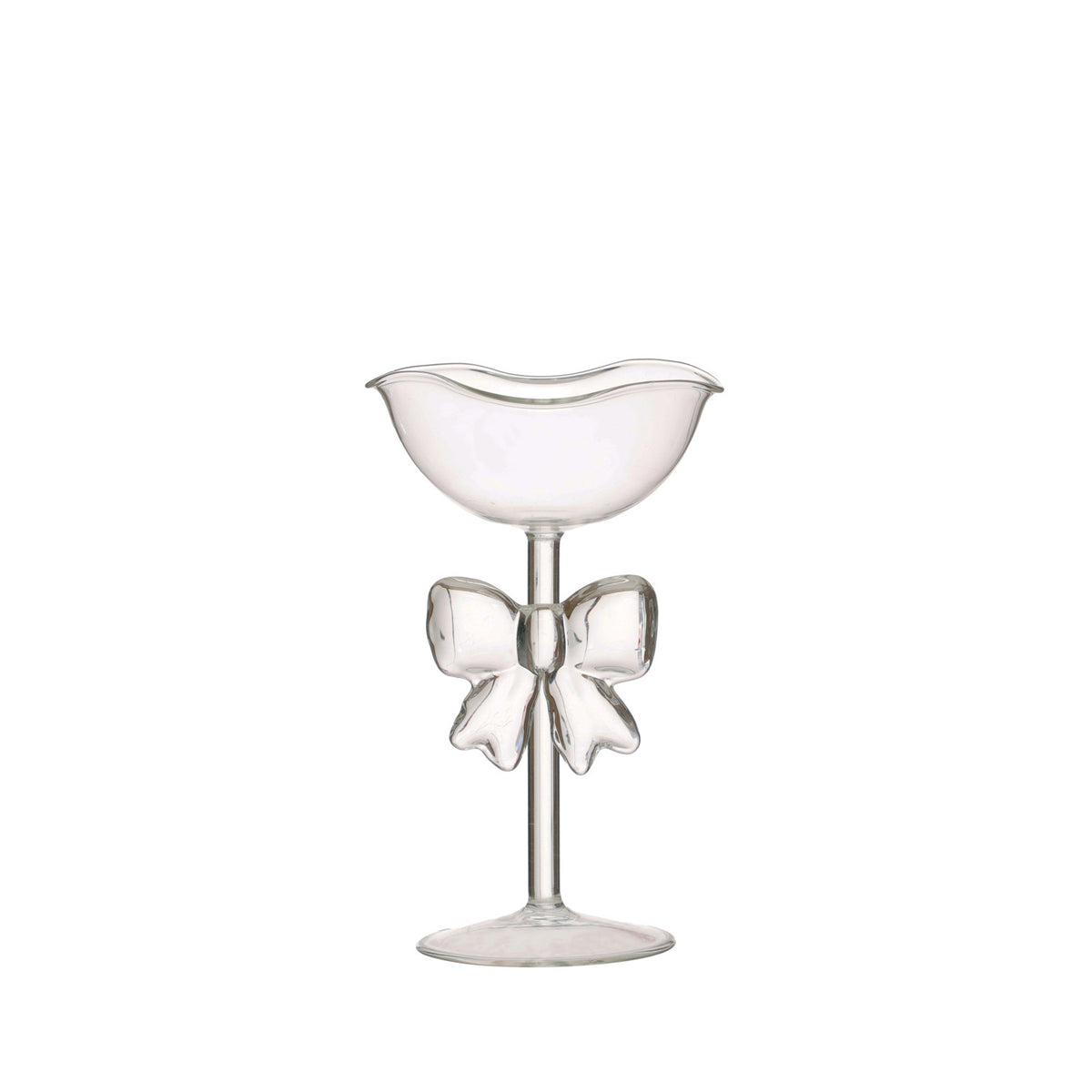 Glass Bow Pedestal Bowl. Elevate your entertaining with our Glass Bow Pedestal Bowl, designed to bring a touch of warm charm and delicate elegance to your table. Perfectly sized for displaying sweet treats, seasonal accents, or favorite holiday snacks, this beautiful piece adds a lovely, whimsical feel to any gathering with friends and family.
