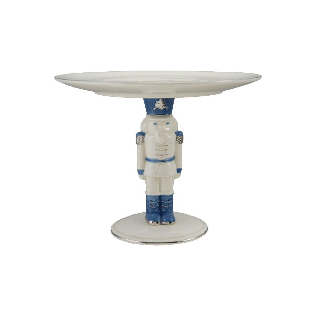 Blue & White Ceramic Nutcracker Pedestal. Bring timeless holiday charm to your table with our Blue & White Ceramic Nutcracker Pedestal. Accented with elegant silver electroplating, this delightful serveware piece is perfect for showcasing your favorite festive treats and creating warm memories with loved ones.