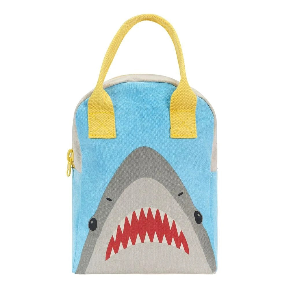 Certified organic cotton. Preshrunk and fully machine washable. Cotton canvas carry handles. Zipper closure. Rinse-able, tested food-safe lining. Interior pocket (for a water bottle or ice pack). Durable and roomy. Lunch bag is lined but not insulated. Water-resistant lining works well with an ice pack, if desired. Shark pattern.