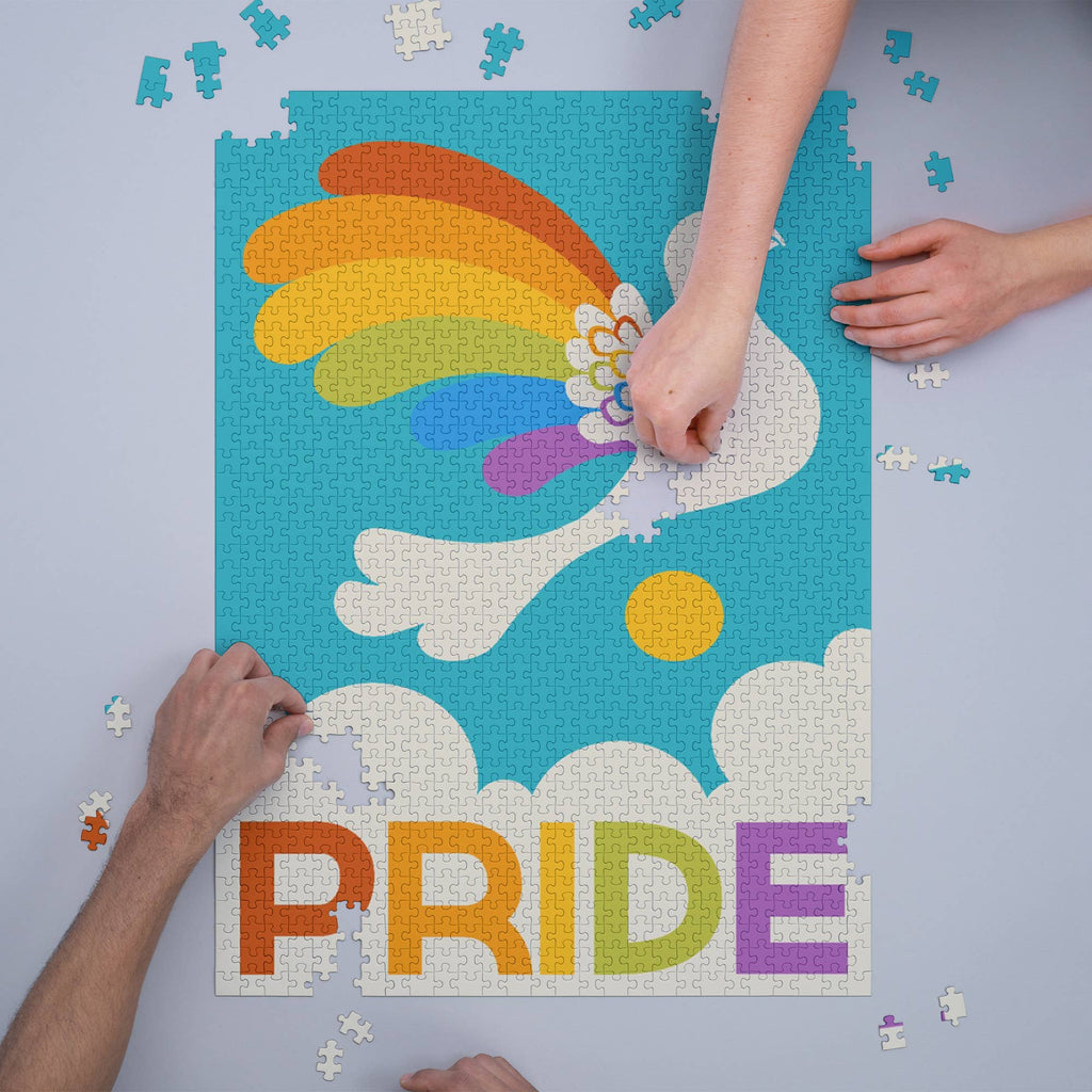 1000 Piece Puzzle Gay Pride - Rainbow Bird     • 1000 piece puzzle  • Glare-free matte finish  • Printed with Eco-friendly inks  • 100% Made in America  • 11 x 17" reference poster included inside  • Puzzle Size - 19 x 28.5 inches  • Puzzle Box Size - 9 x 9 x 2